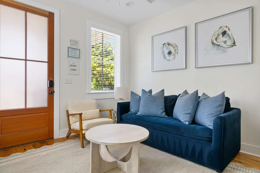 Living room space with a sleeper sofa 