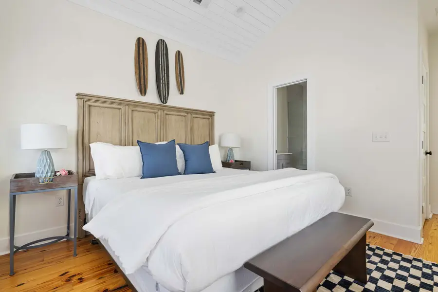 Bedroom #1: King Bed + TV + Ceiling Fan + Balcony 
