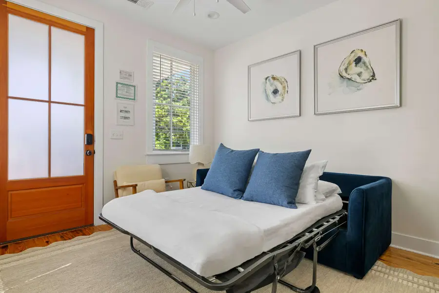 Living room space with a sleeper sofa 