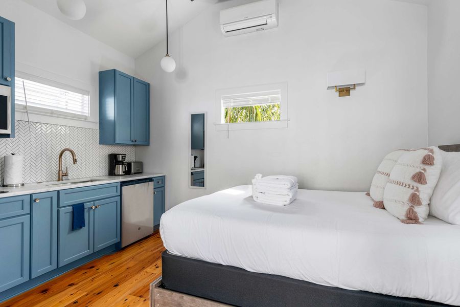 Bedroom 5: Queen Bed + TV + Kitchenette