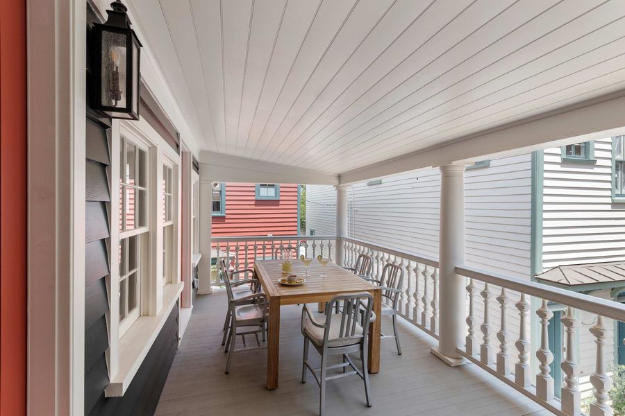Second floor porch with outdoor dining area