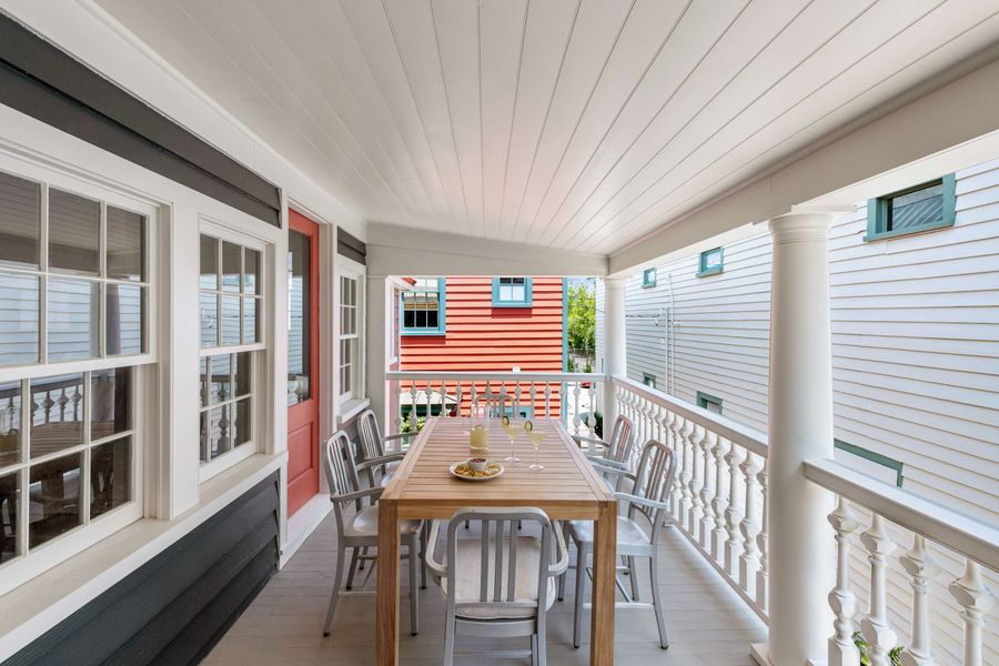 Second floor porch with outdoor dining area
