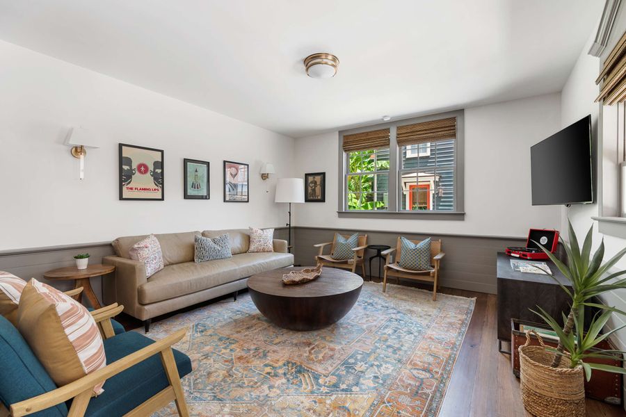 Spacious living room with seating for your entire group + TV!
