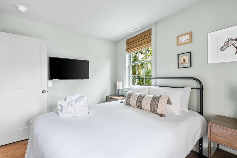 Bedroom 2: Queen Bed + TV