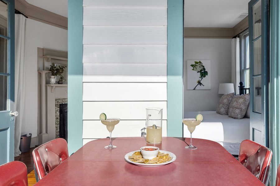 Second floor porch with dining and seating