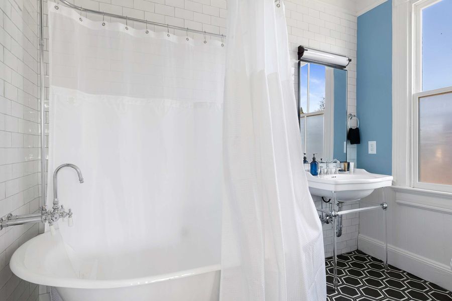 Bathroom 2: Full bathroom with classic clawfoot tub