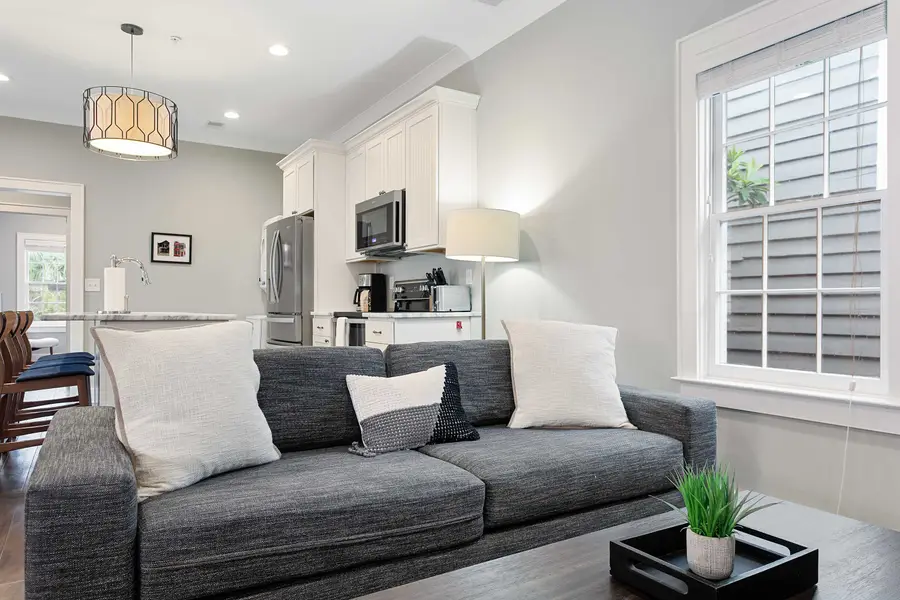 A welcoming living space with a TV and sleeper sofa for extra sleeping accommodations.