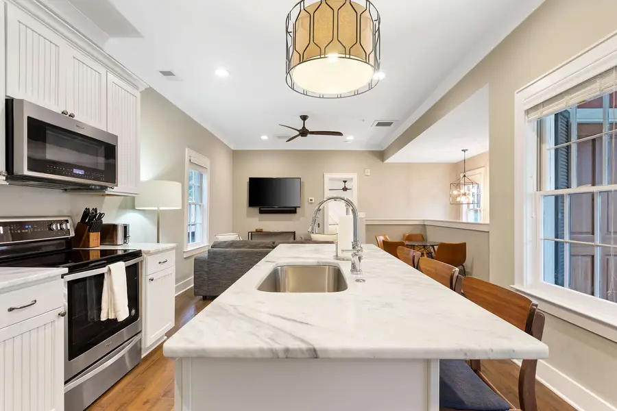 Kitchen island with bar seating for three, perfect for casual dining and conversation.