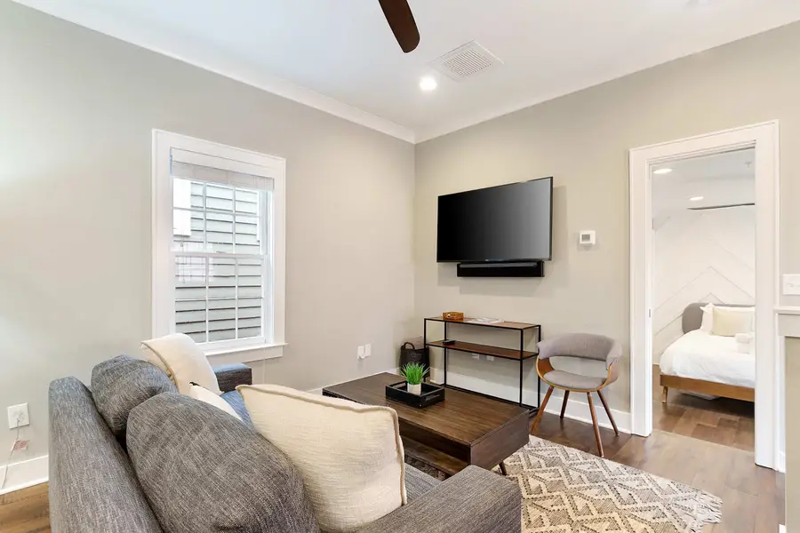 A welcoming living space with a TV and sleeper sofa for extra sleeping accommodations.