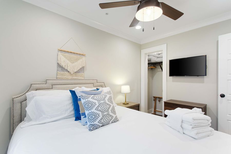 Bedroom 2: Queen Bed + TV