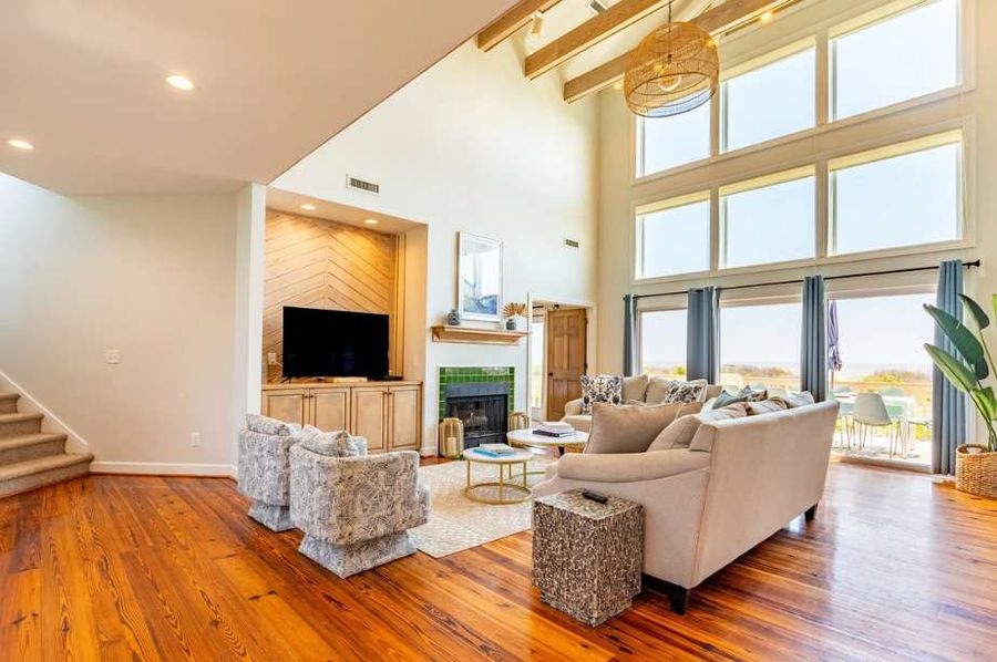 Open air, high ceilings with exposed beams provide a luxury feel.