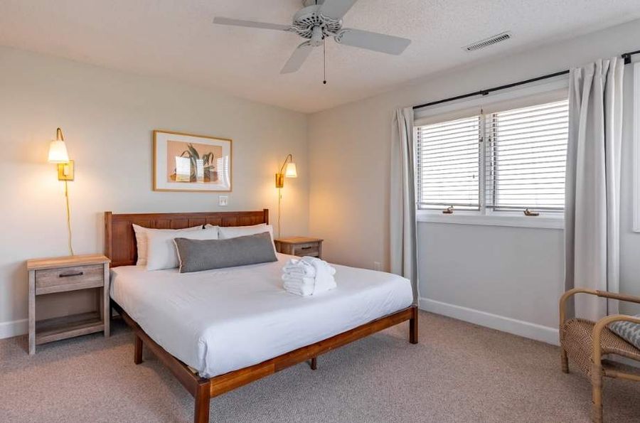 Enjoy the comfort of a king-size bed in a bright, airy room with plenty of space to unwind.