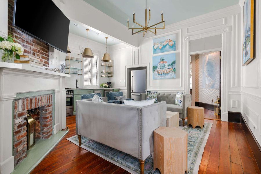 Primary living room with plenty of seating for your group + TV!