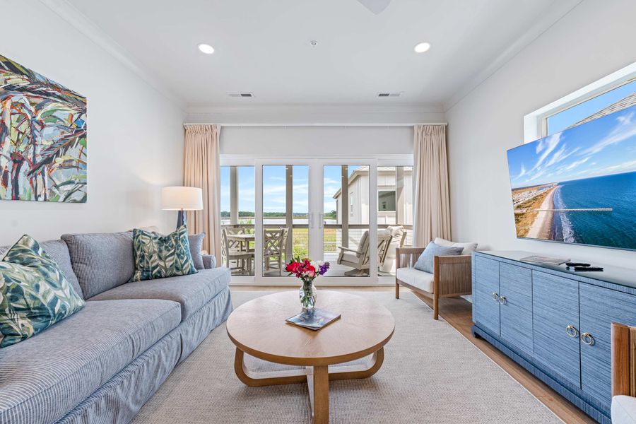 Spacious living room with a pullout sofa for additional sleeping space 