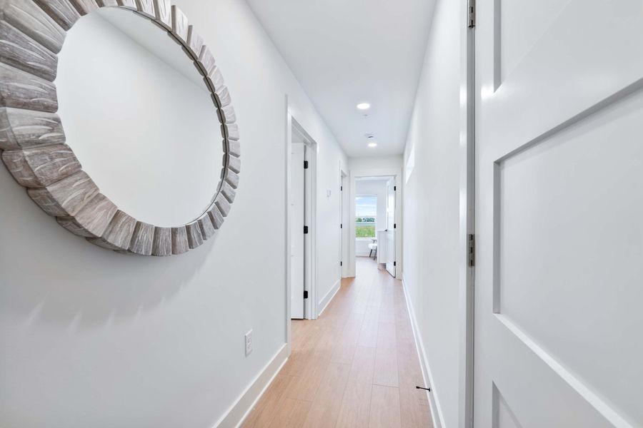 Downstairs hallway that leads to the bedrooms 