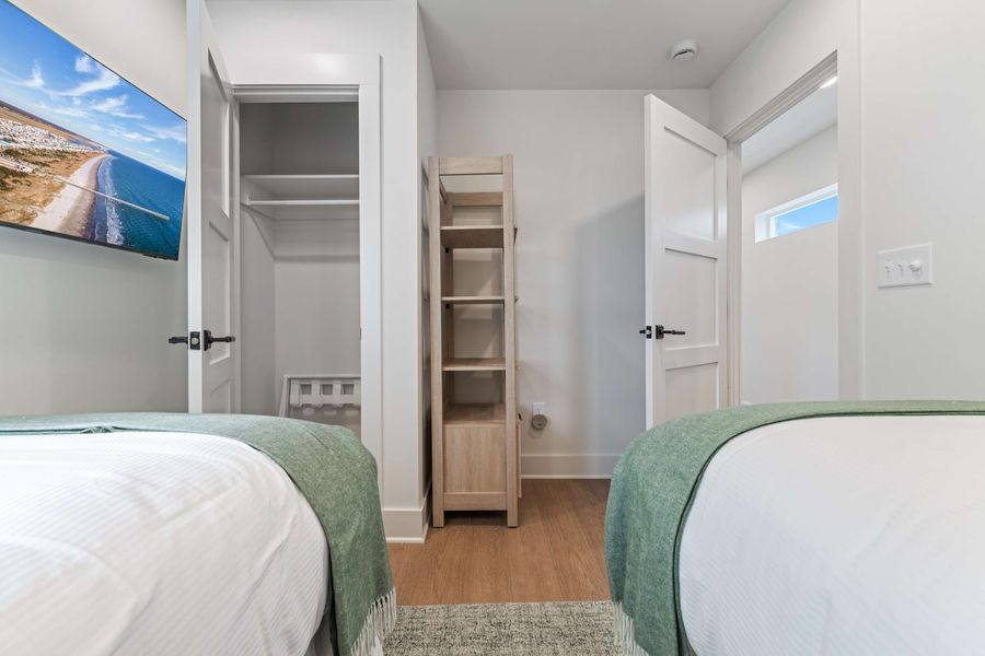 Bedroom 2: Two Twin Beds - (Can be converted to a King Bed on request) + ceiling fan