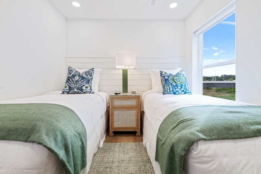 Bedroom 2: Two Twin Beds - (Can be converted to a King Bed on request) + ceiling fan