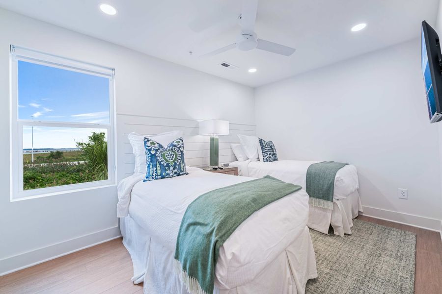 Bedroom 2: Two Twin Beds (can be converted to a King Bed) + TV 