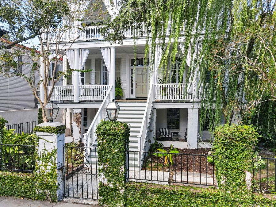 Beautiful Charleston style porches on each level of the home