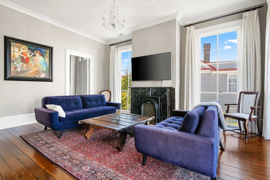 Spacious living room with plenty of seating for your group 