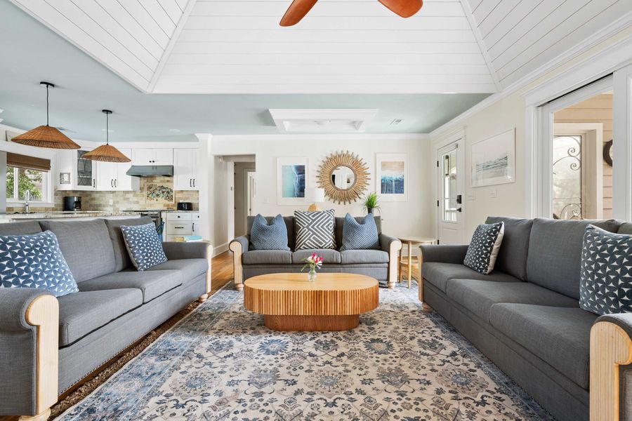 Spacious living room with plenty of seating for your group 