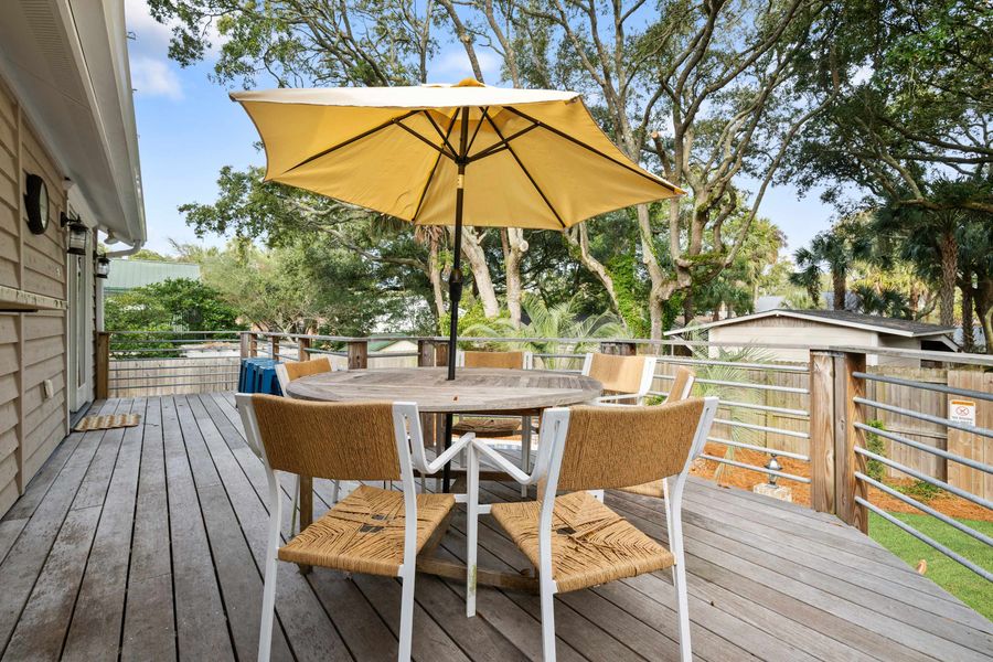 Back porch with dining seating 