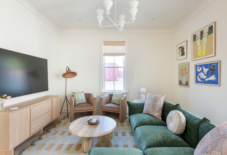 A refined living space designed to host, lounge, and linger - anchored by curated art, plush seating, and warm, modern finishes.