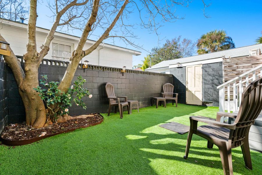 Backyard turf area with seating for your group 