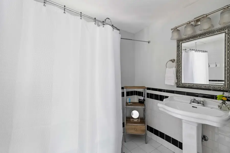 Bathroom 1: Shower/Tub