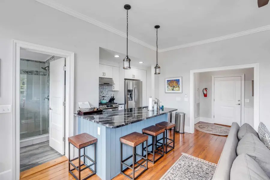 Fully equipped kitchen with a spacious island and everything you need to cook, dine, and gather.