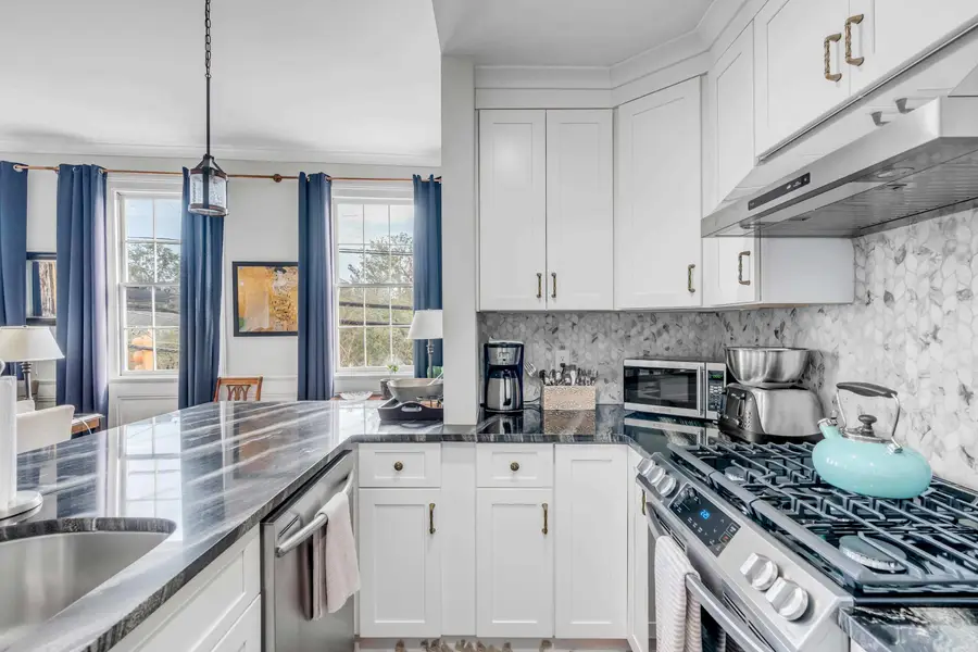 Fully equipped kitchen with a spacious island and everything you need to cook, dine, and gather.