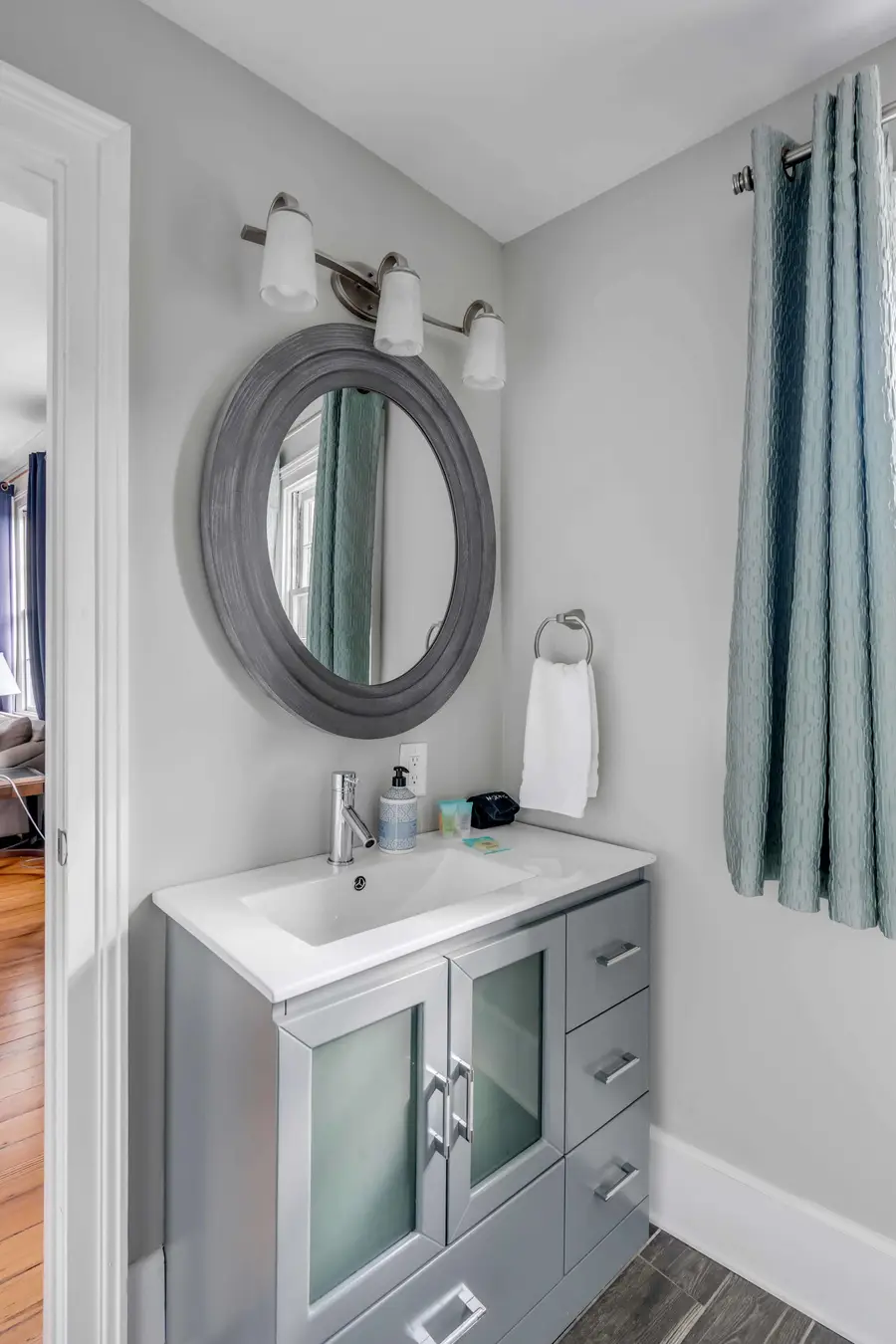 Bathroom 1: Modern bathroom featuring a spacious walk-in shower.