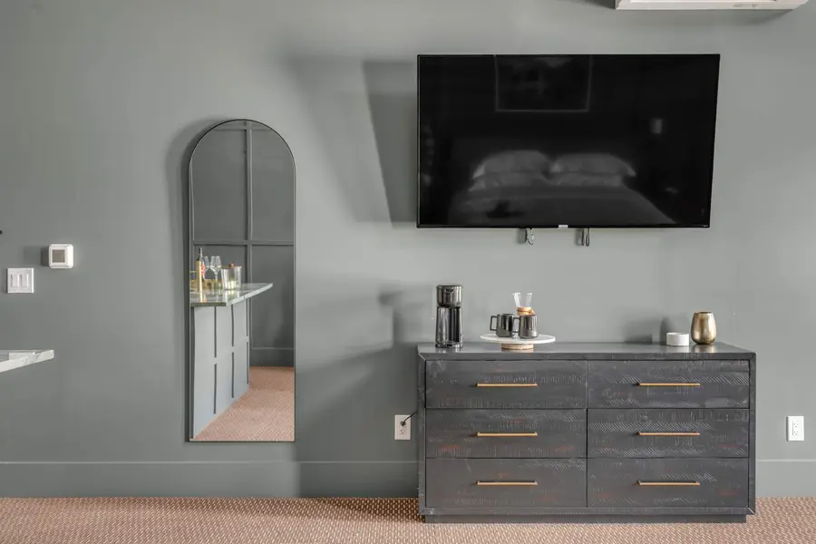 Full length mirror, TV and coffee maker