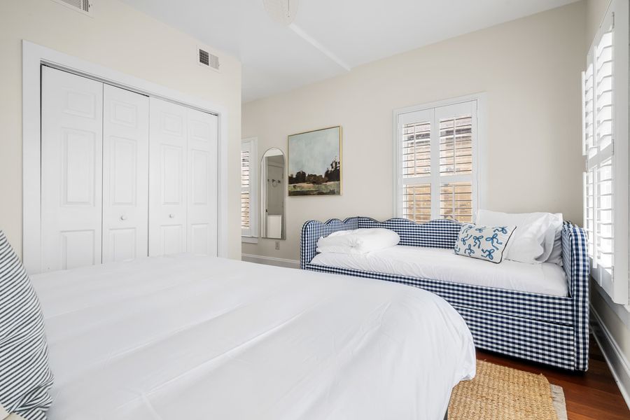 Bedroom 1: King Bed + Daybed (Twin) + Private Balcony + TV