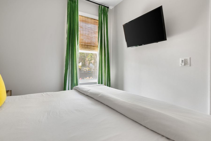 Bedroom 3: King Bed + TV