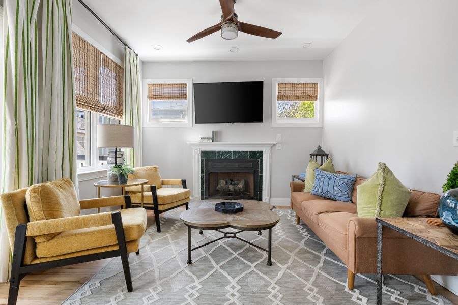 Unit A: Full Living Room with large porch and double doors.