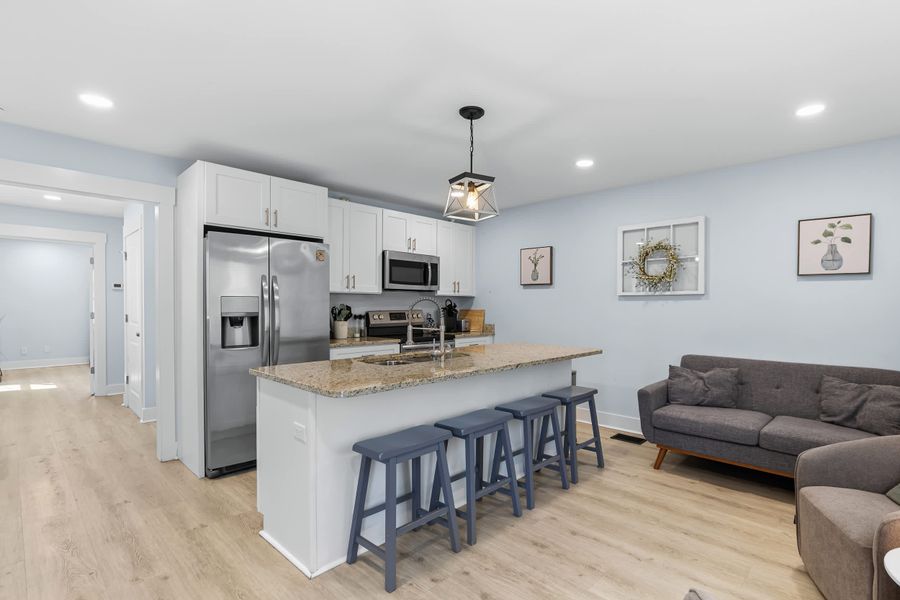Kitchen and open concept living room space.