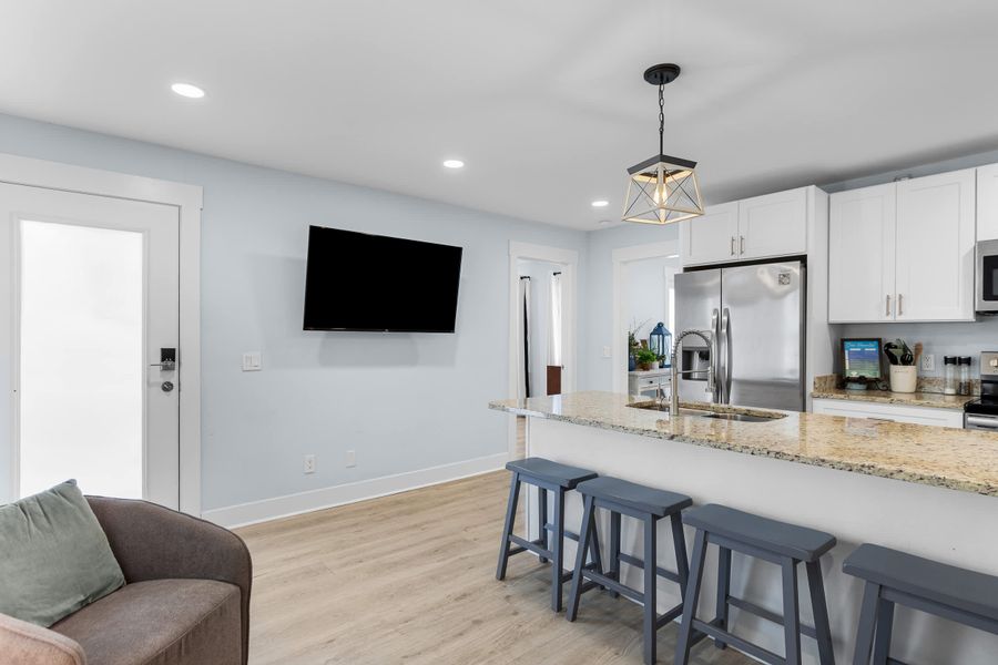Bar seat dining and entertainment lounge.