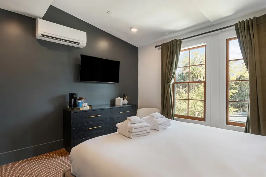Bedroom 1: Queen Bed + TV