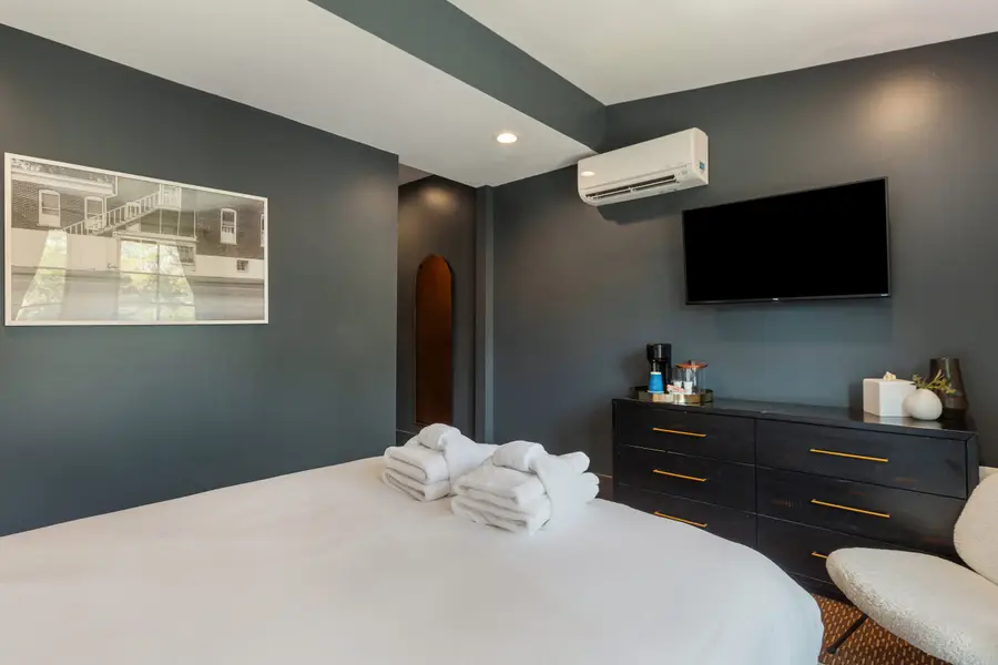 Bedroom 1: Queen Bed + TV