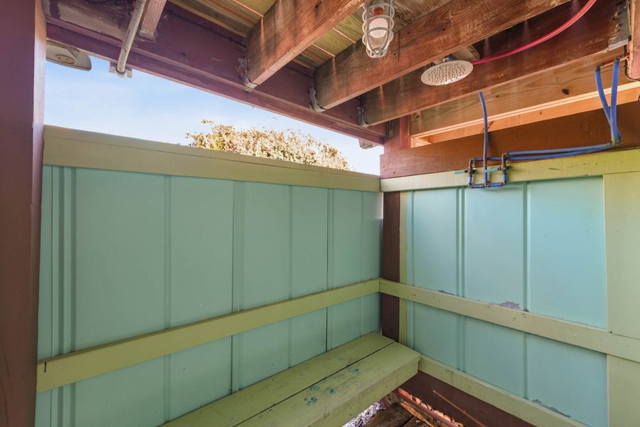 Outdoor shower for an after-surf rinse.