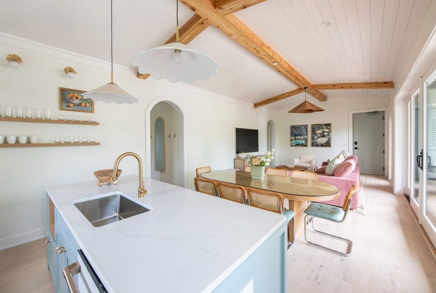View of kitchen island and dining