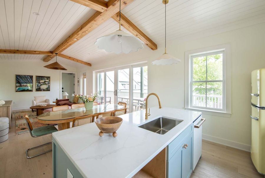 View of kitchen island and dining