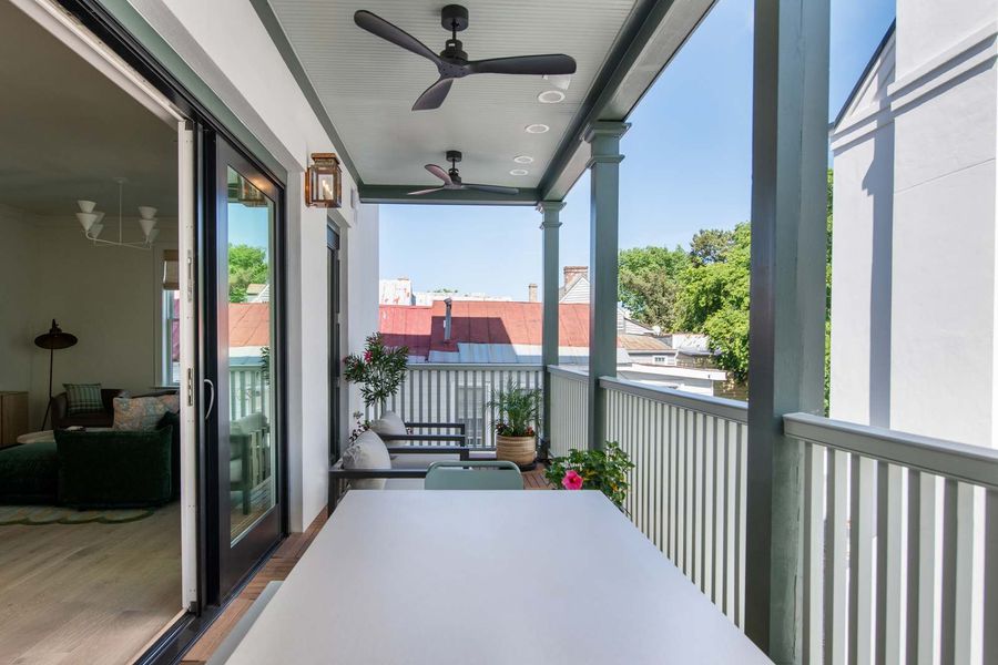 Enjoy a spacious outdoor balcony with generous seating - great for morning coffee, evening chats, or simply soaking in Charleston