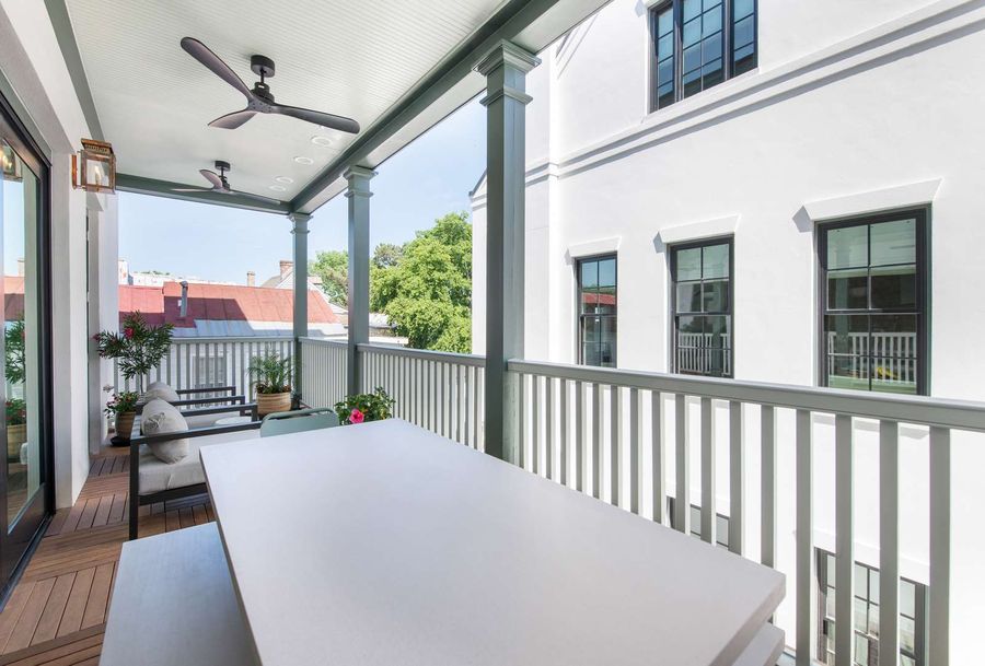 Enjoy a spacious outdoor balcony with generous seating - great for morning coffee, evening chats, or simply soaking in Charleston