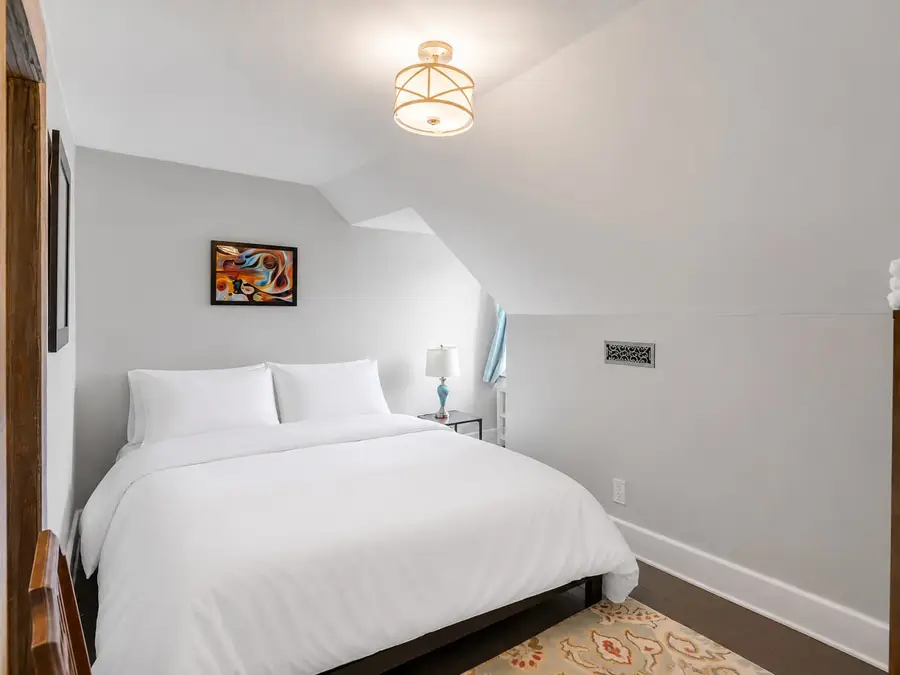 Bedroom 2: Spacious king retreat offering comfort and privacy.