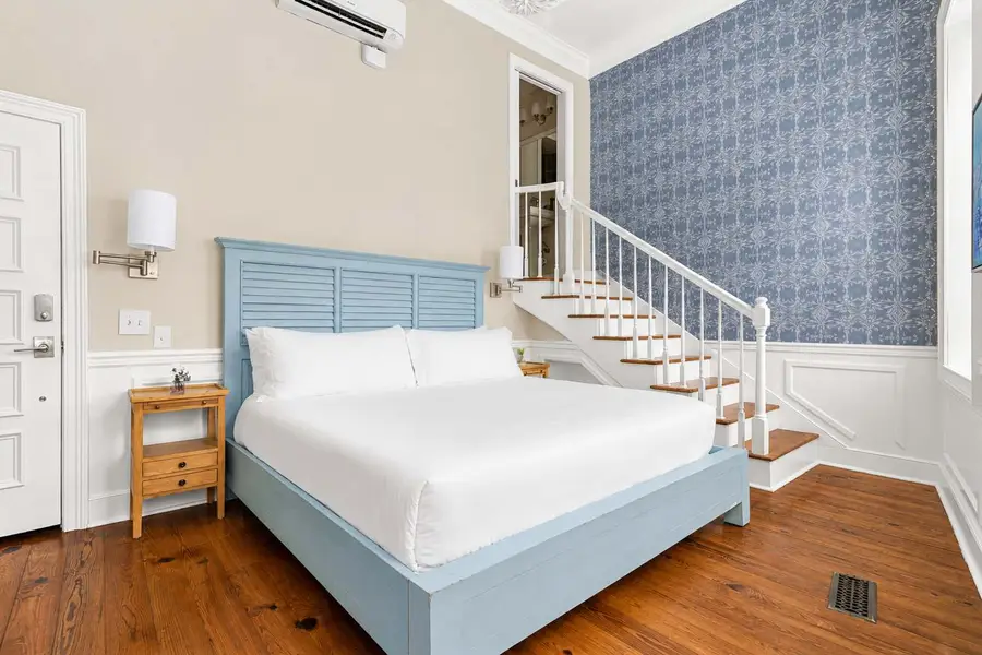 Welcome to your Downtown Charleston loft, where timeless elegance, historic charm, and an unbeatable location come together!