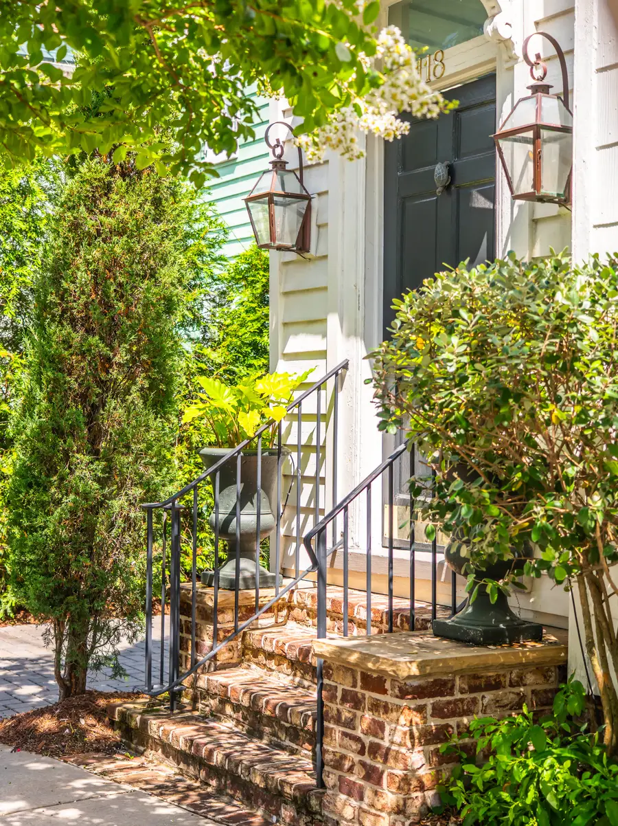 The welcoming front entry and four-step staircase offer a warm first impression as you arrive at your vacation home.