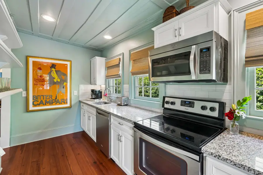 Thoughtfully appointed with modern appliances, generous natural light, and all the cooking and dining essentials, this kitchen makes every meal feel at home.