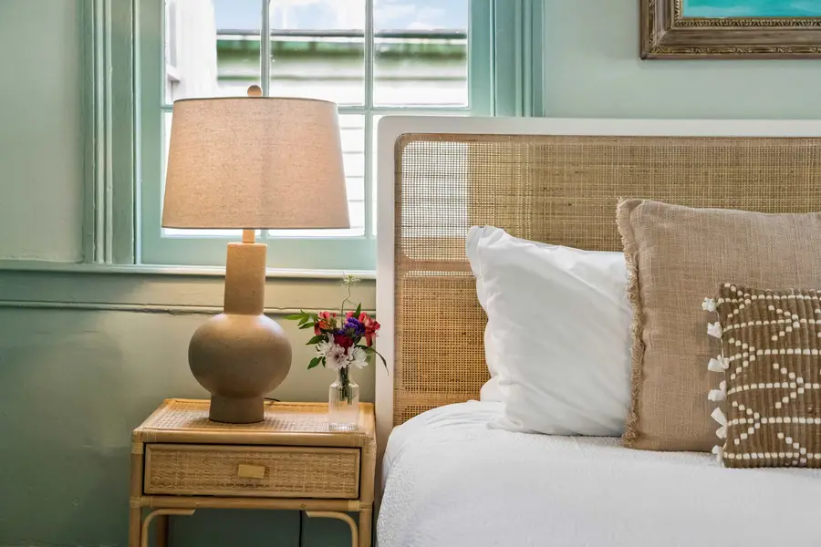 Bedroom #2: Designed with a king bed, Smart TV, beautiful natural light, and a stylish vanity that doubles as a workspace.